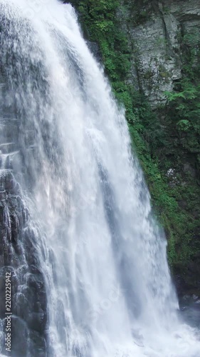 Waterfall Spray Against Rock Face Close Up Vertical Video