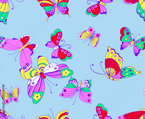 Colorful butterflies on light blue background with vibrant wings