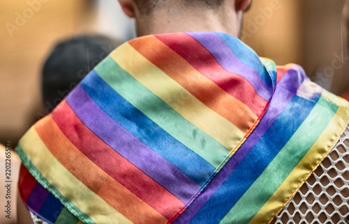 Картината върху платно a lgbt flag on the shoulder of person, Bangkok Thailand