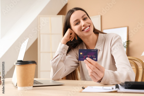 Online shopping and digital payment, happy woman holding credit card for e-co...
