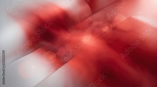 A red and white abstract background with a red cross in the center, featuring a mix of red and white colors with a blurred, bokeh effect.