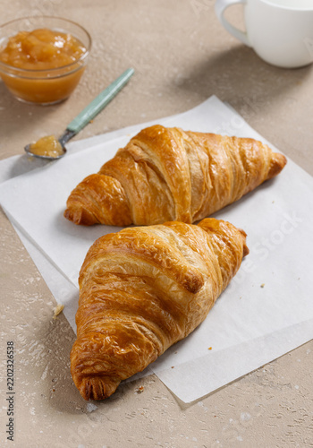 Obraz na płótnie two freshly baked croissants