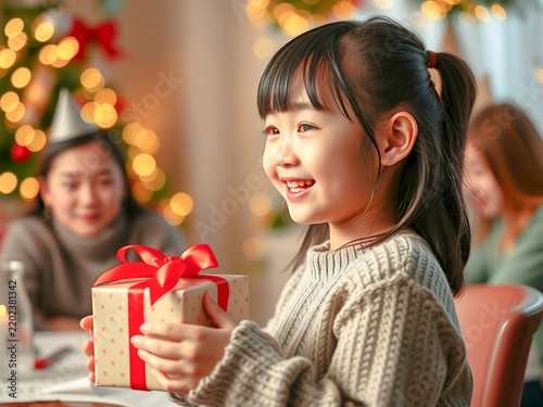 Obraz na płótnie クリスマスプレゼントをもらう女児1789