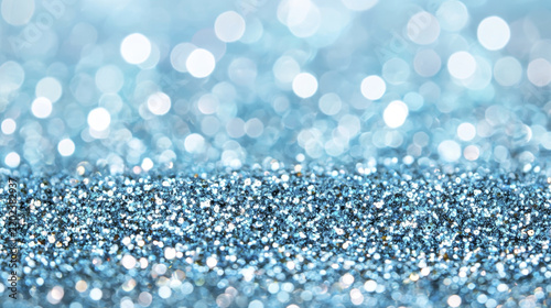 Shimmering blue glitter background creates vibrant and festive atmosphere, perfect for celebrations and creative projects