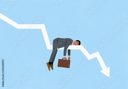 Exhausted businessman with briefcase sleeping on declining arrow chart against blue background