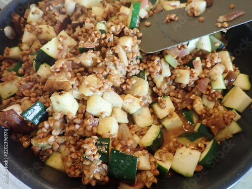 fresh healthy buckwheat warm salad with vegetables
