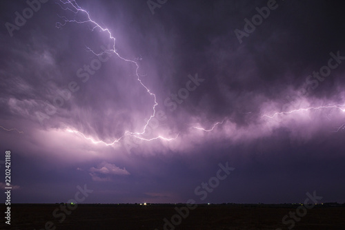 Lightning strike during storm at night in la junta colorado