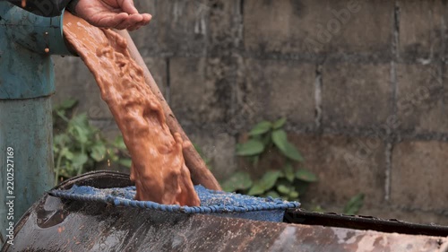 Hand Checking Underground Water Source After Drilling