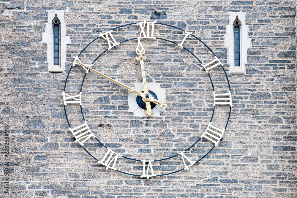 Obraz premium Roman numeral clock in a colonial style wall, Toronto
