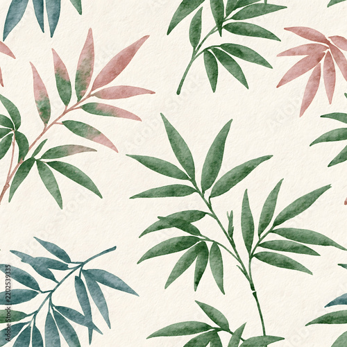 Watercolor tropical leaves pattern on textured paper background