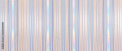 Soft vertical stripes in champagne and periwinkle tones with a gentle