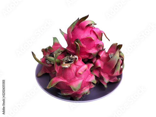 Fresh and colorful dragon fruits served in a bowl isolated on clear background 