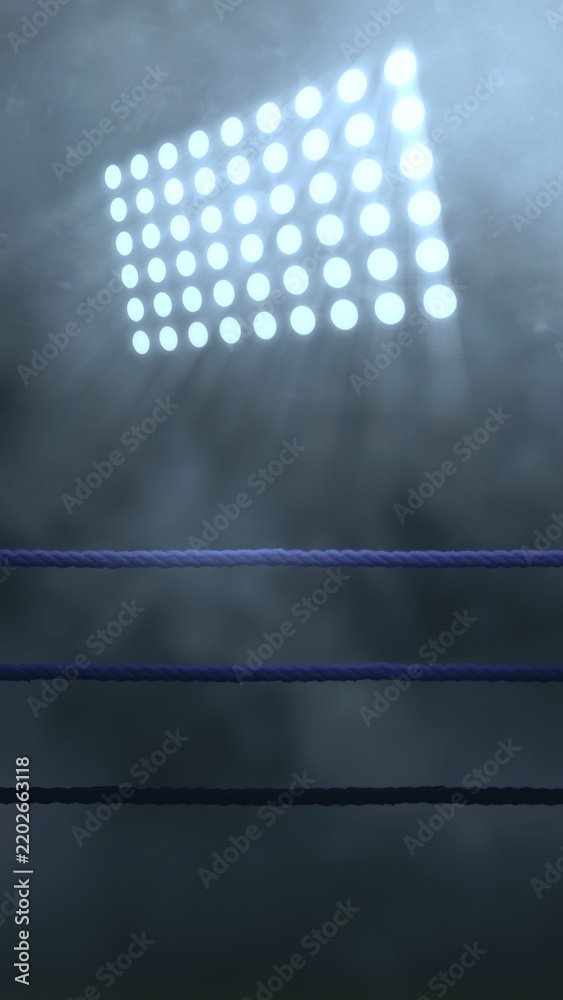 Fototapeta premium Empty boxing ring with blue ropes illuminated by bright stadium floodlights through dark atmospheric smoke and mist. Dramatic combat sports arena background. Sport background
