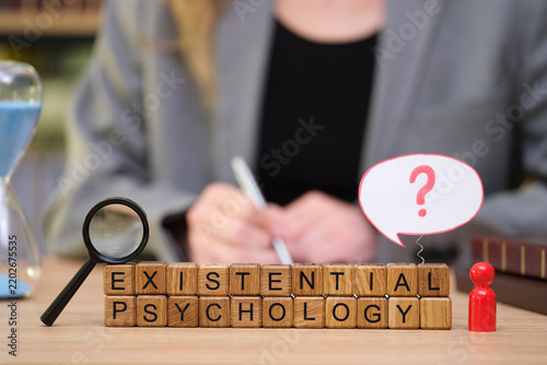 Canvas Print A focused individual examines concepts of existential psychology