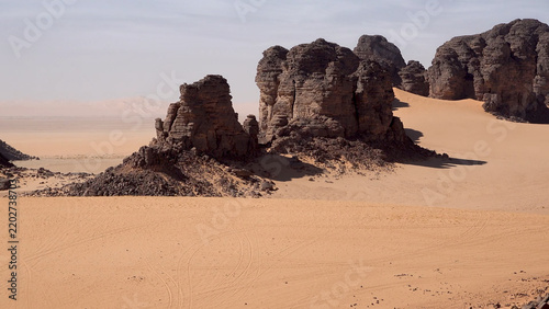 Trip to Sahara desert in Algeria. Beautiful african travel photo. Landscape with sandstone mountains, sand, sky, nature. Summer vacation in arab country.