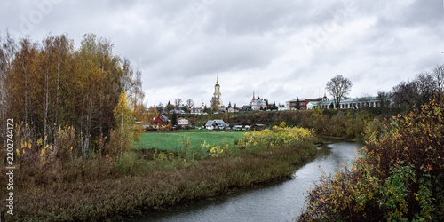 Kamenka River and the Venerable Bell tower of the Monastery of the Ordination of the Sacrament and the Church of Bishop Antipius
