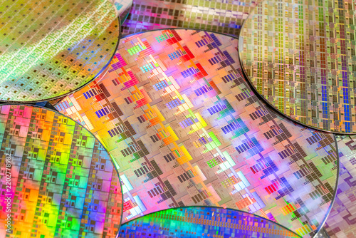 silicon wafer for manufacturing semiconductor of integrated circuit.Electronic circuit designs have been built onto the wafers using micromaching including photolithography