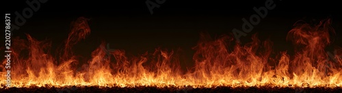Study of a continuous wall of fire burning across a black background