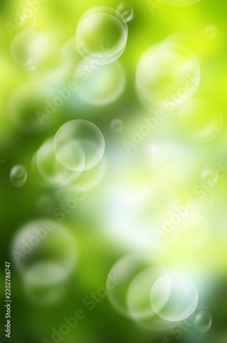 Green bokeh abstract background blur, vertical hpliday wallpaper