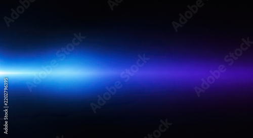 A bright blue light streak dominates the dark background. The light appears to emanate from a distant point, creating a gradient of color from blue to purple.