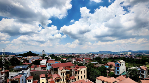 Panoramic cityscape of Lang Son, Vietnam under dramatic clouds