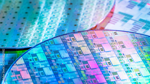 silicon wafer for manufacturing semiconductor of integrated circuit.Electronic circuit designs have been built onto the wafers using micromaching including photolithography