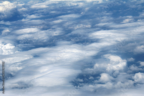 Aerial View of Dramatic Layered Cloudscape Above the Sky
