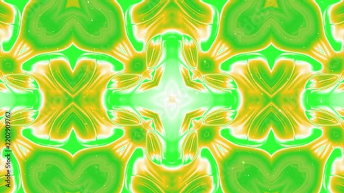 Vibrant green and yellow abstract kaleidoscope pattern with glowing light effects.