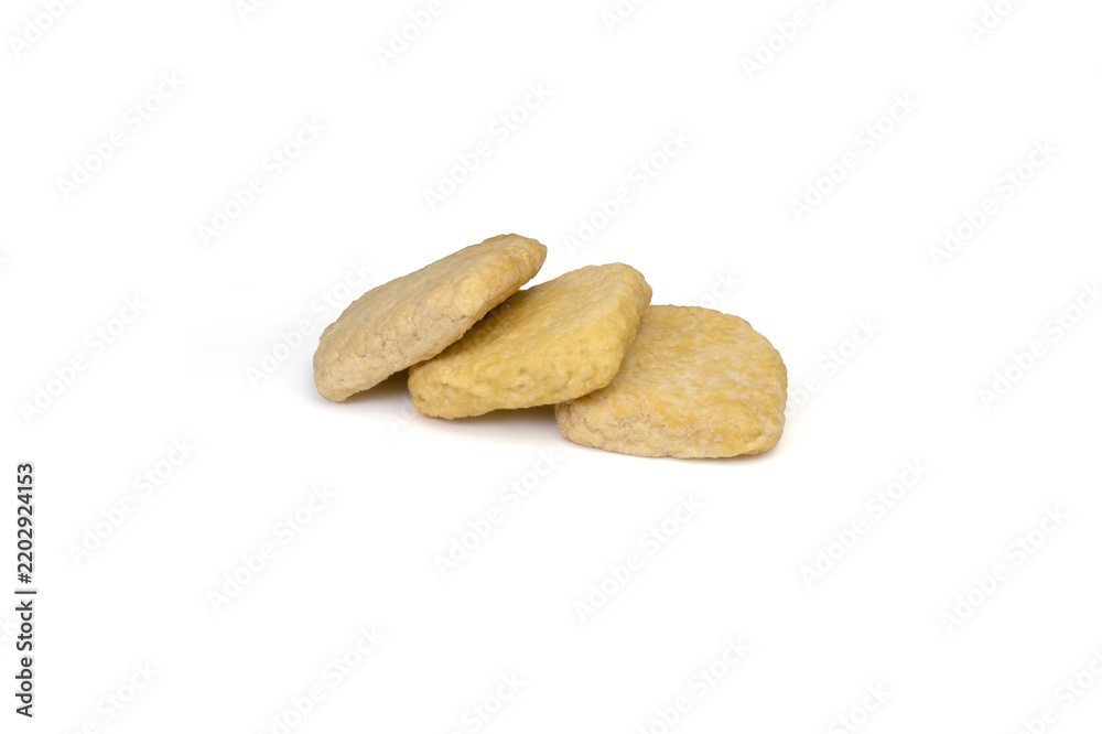 Fototapeta premium Baked tofu pockets arranged on isolated white background