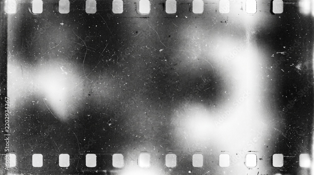 Obraz premium Old film texture with scratches, noise and light leaks. Realistic transparent overlay film texture in black-white, dust and grain. Distressed retro movie or photo negative effect of cinema nostalgia