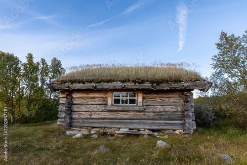 Traditional Log Cabin with Turf Roof in Dovrefjell, Norway