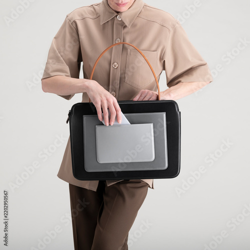 Professional Carrying Briefcase With Neutral Outfit