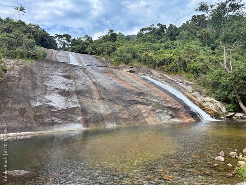 Veloso Waterfall in Ilhabela, Brazil.