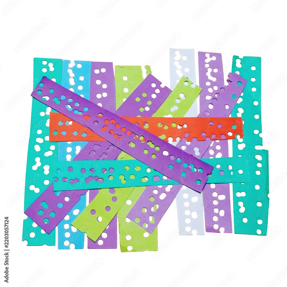 Fototapeta premium Colorful paper strips with punched holes on white background isolated on a transparent background
