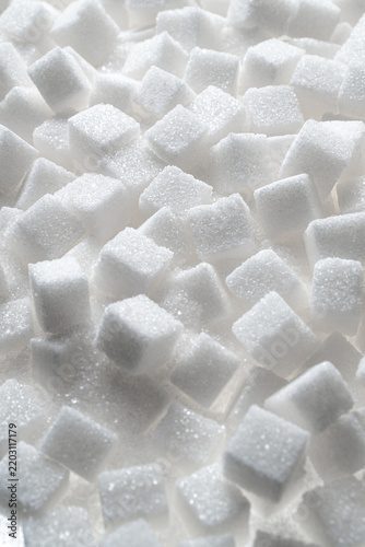 Fotografía Pile of white sugar cubes background
