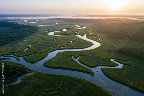 Winding Tidal Creek Through Coastal Marsh at Sunrise