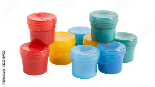 Konstfotografi Isolated assortment of colorful plastic jars for kids' paint, playdough, or art supplies