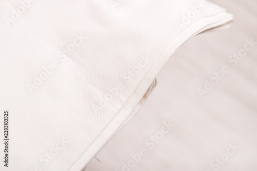 White fabric edge with seam detail close up texture