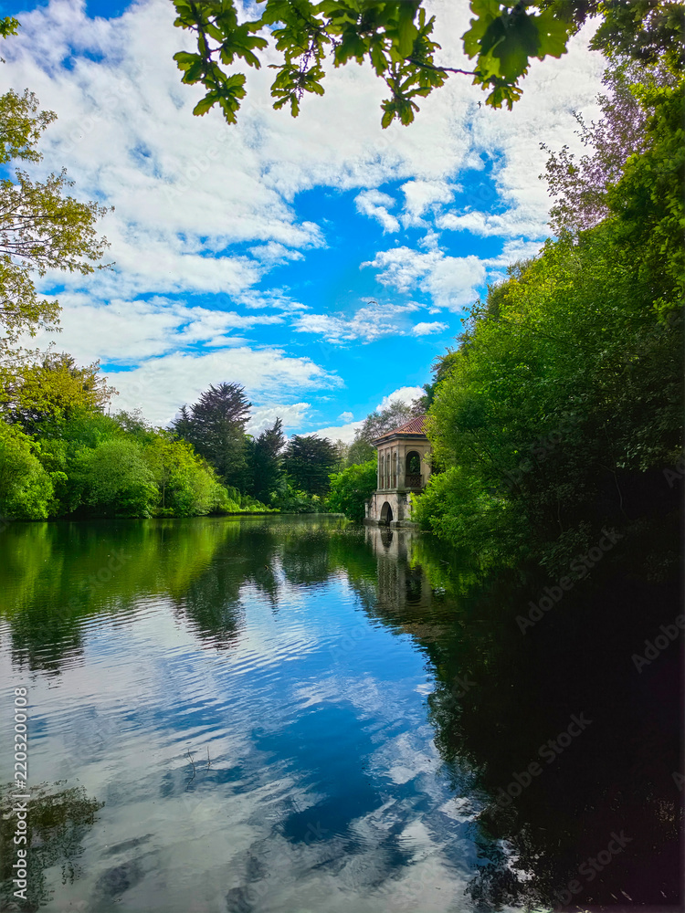 Fototapeta premium Roman Boathouse by the lake in Birkenhead Park, located in Merseyside, England. Birkenhead Park is the world's first publicly funded, purpose-built public park, tentative world heritage site