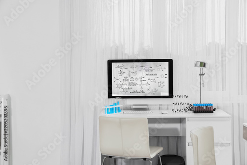 Scientific research and chemistry education, computer monitor with chemical f...