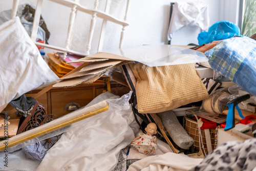 Quadro su tela Messy bedroom interior with clothes pile, and objects, chaotic interior, hoardin