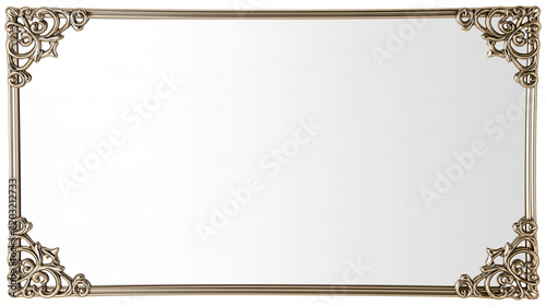 Isolated ornate antique metal picture frame with decorative corner scrolls and blank interior