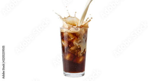 Obraz na plátně Cream being poured into a glass of iced coffee creating a dynamic splash on whit