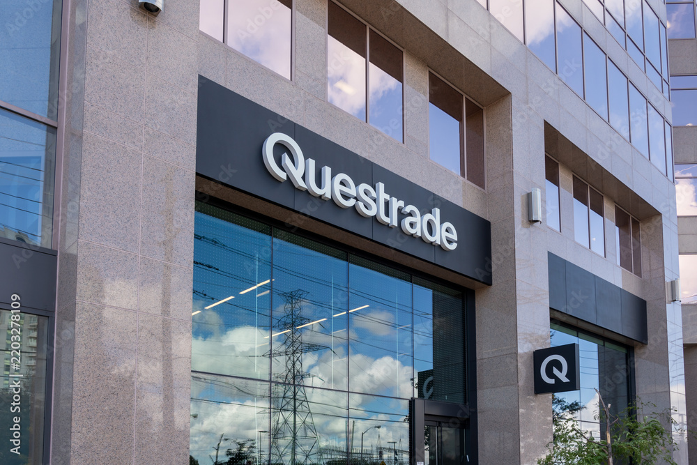 Fototapeta premium Toronto, Ontario, Canada - September 23, 2026: The entrance to Questrade headquarters on Yonge Street in Toronto, Ontario, Canada. Questrade Financial Group is a Canadian online brokerage and wealth m