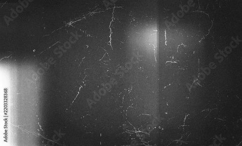grunge overlay effect with scratch and dust on black background, retro noisy grain dust texture for film or photo overlay effect on black background, old photo overlay texture