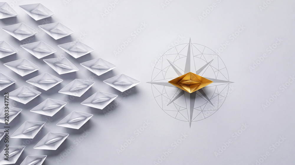 Fototapeta premium Golden Paper Boat Leading a Fleet of White Boats Over a Compass Graphic, Representing Leadership, Visionary Business Strategy, Navigation Towards Success, and Professional Directional Guidance.