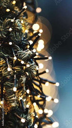 Decorated Christmas Tree With A Blurred Holiday Abstract Bokeh Background Creates A Festive Atmosphere