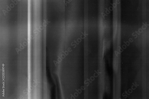 Analog scan and film interference overlay texture collection featuring horizontal scan lines, bright light streaks, film grain, distorted bands and monochrome black and white noise effects, ideal for 