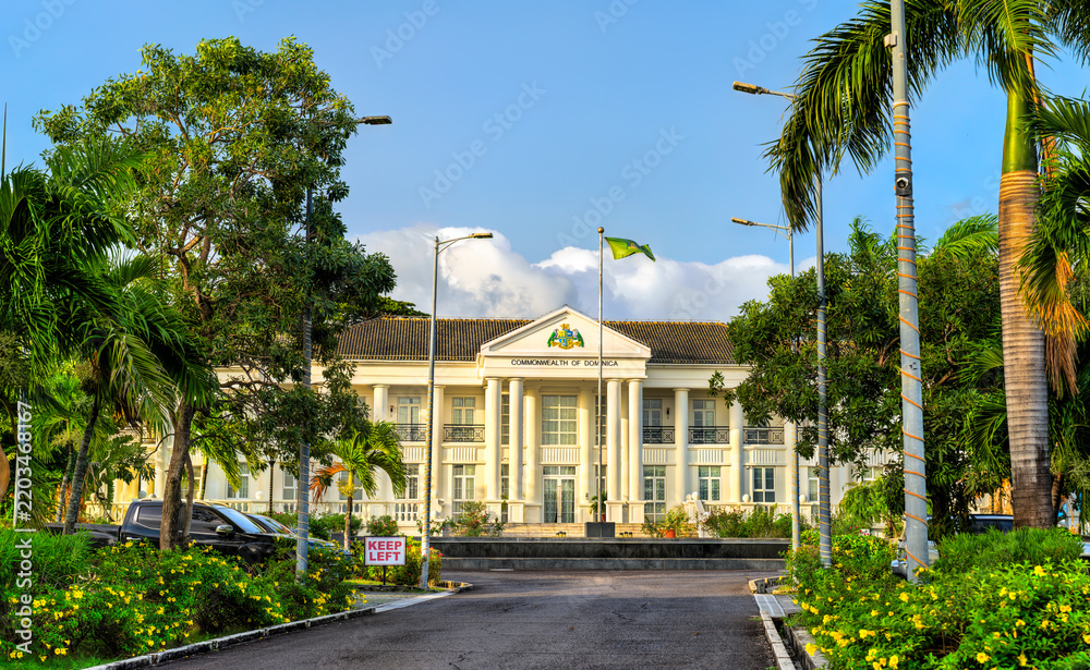 Obraz premium The State House, the residence of the president of Dominica surrounded by tropical trees in the capital city of Roseau