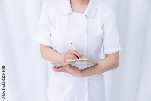 Plakat カルテを記入する看護師